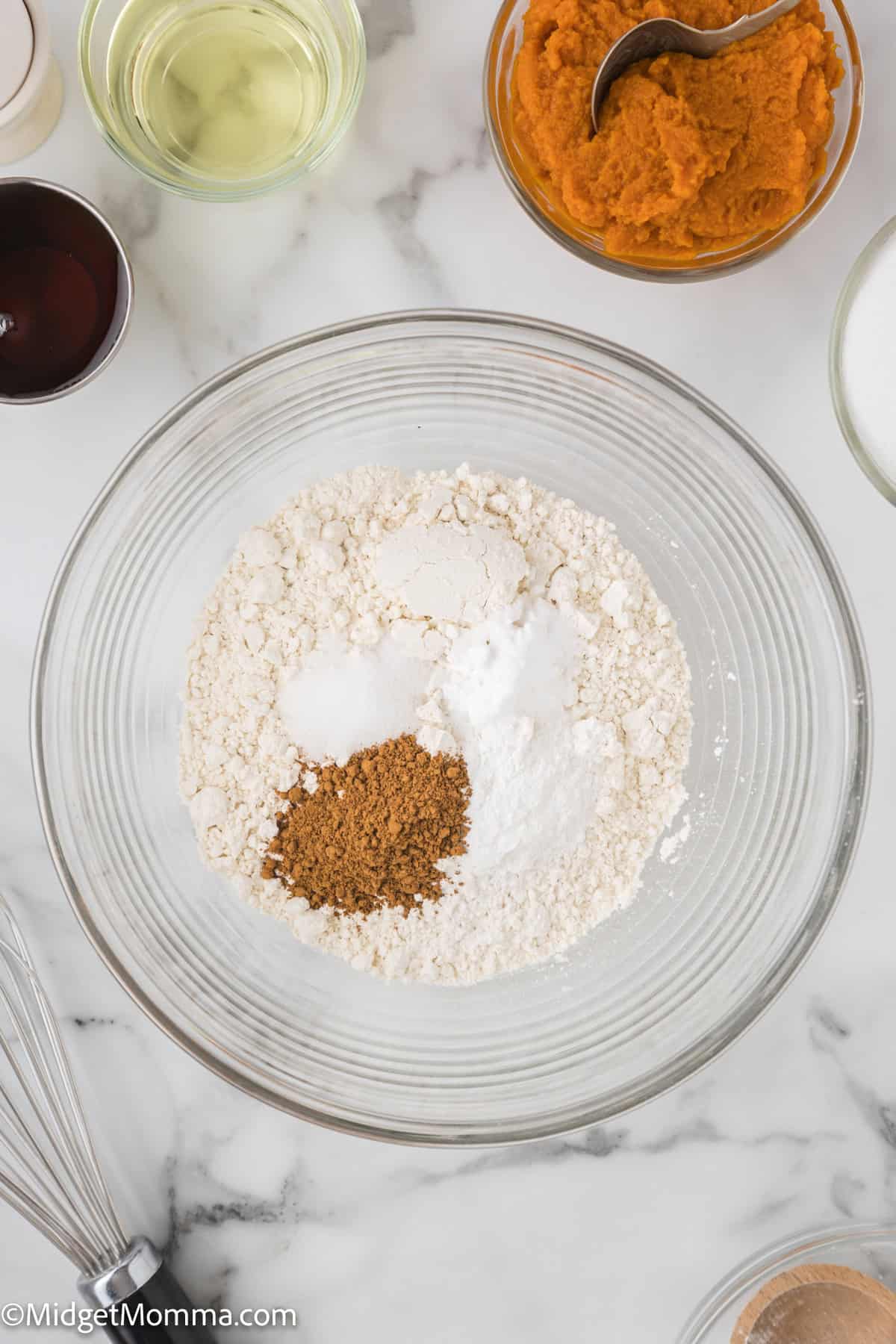 maple Pumpkin Bread with Pecan Maple Streusel Topping dry ingredients in a bowl