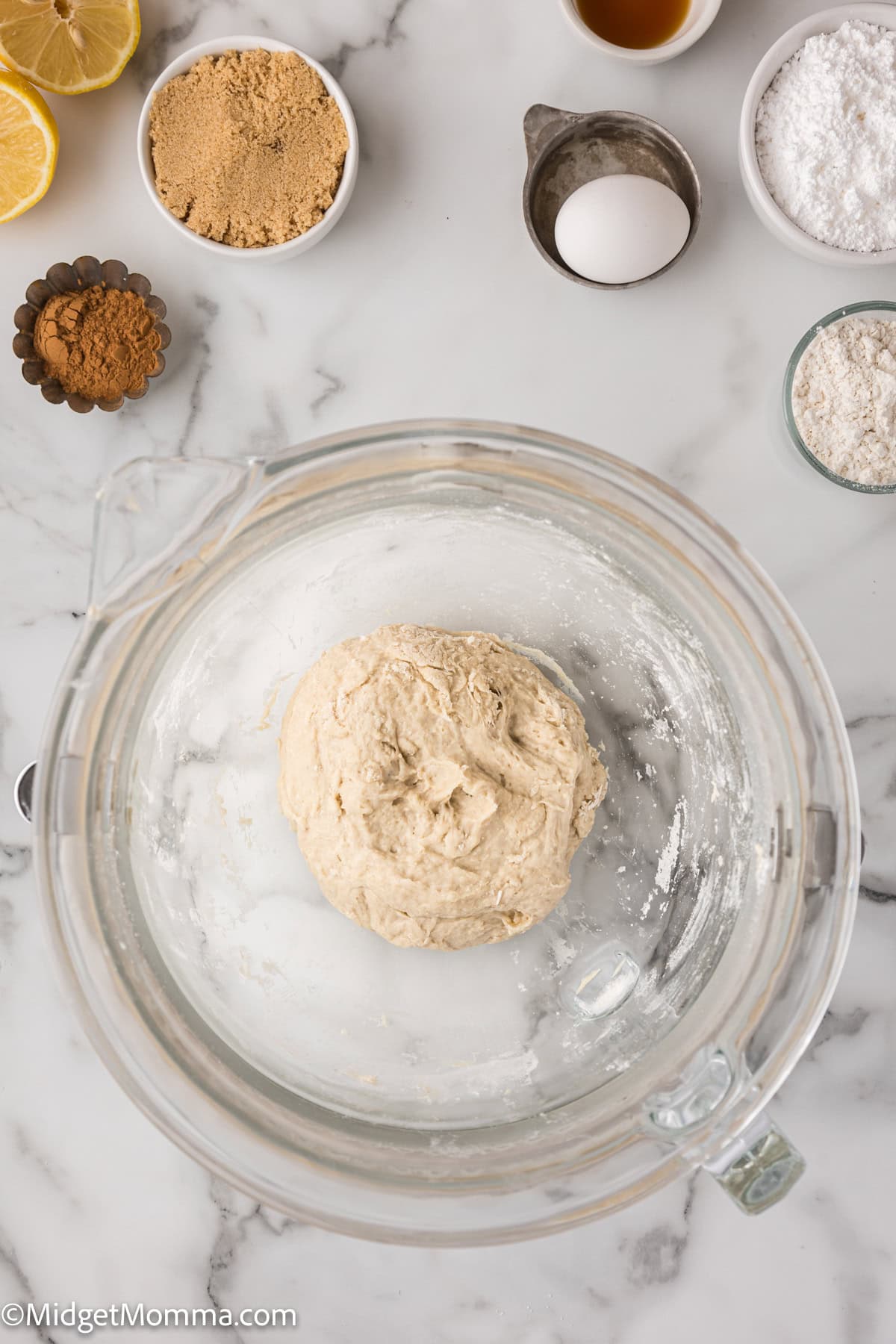 homemade cinnamon roll dough in a bowl